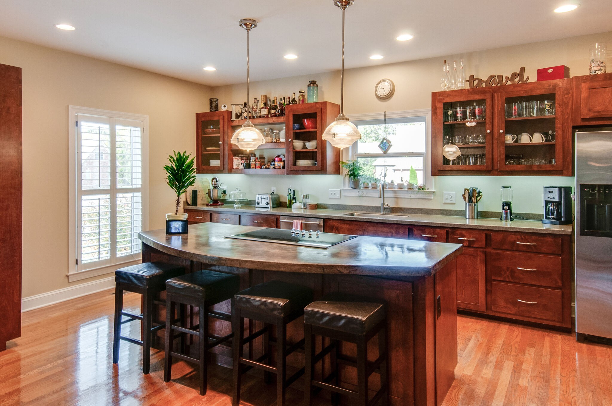 200 Ridgewater Way Mount Juliet, TN 37122 - Photo 11 of 37 a kitchen with stainless steel appliances kitchen island granite countertop a table and chairs in it