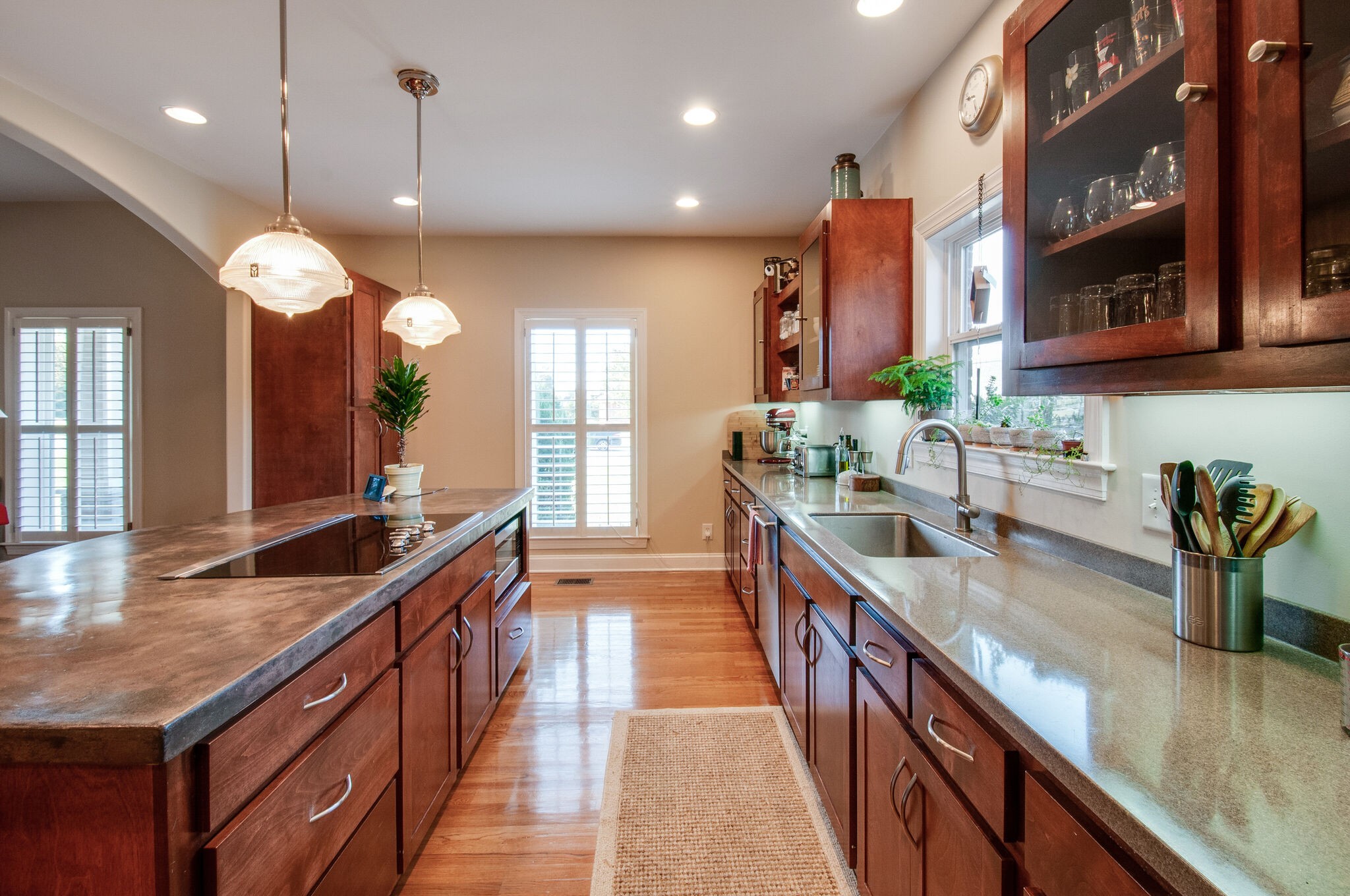 200 Ridgewater Way Mount Juliet, TN 37122 - Photo 12 of 37 a kitchen with kitchen island granite countertop a sink a counter top space and living room view