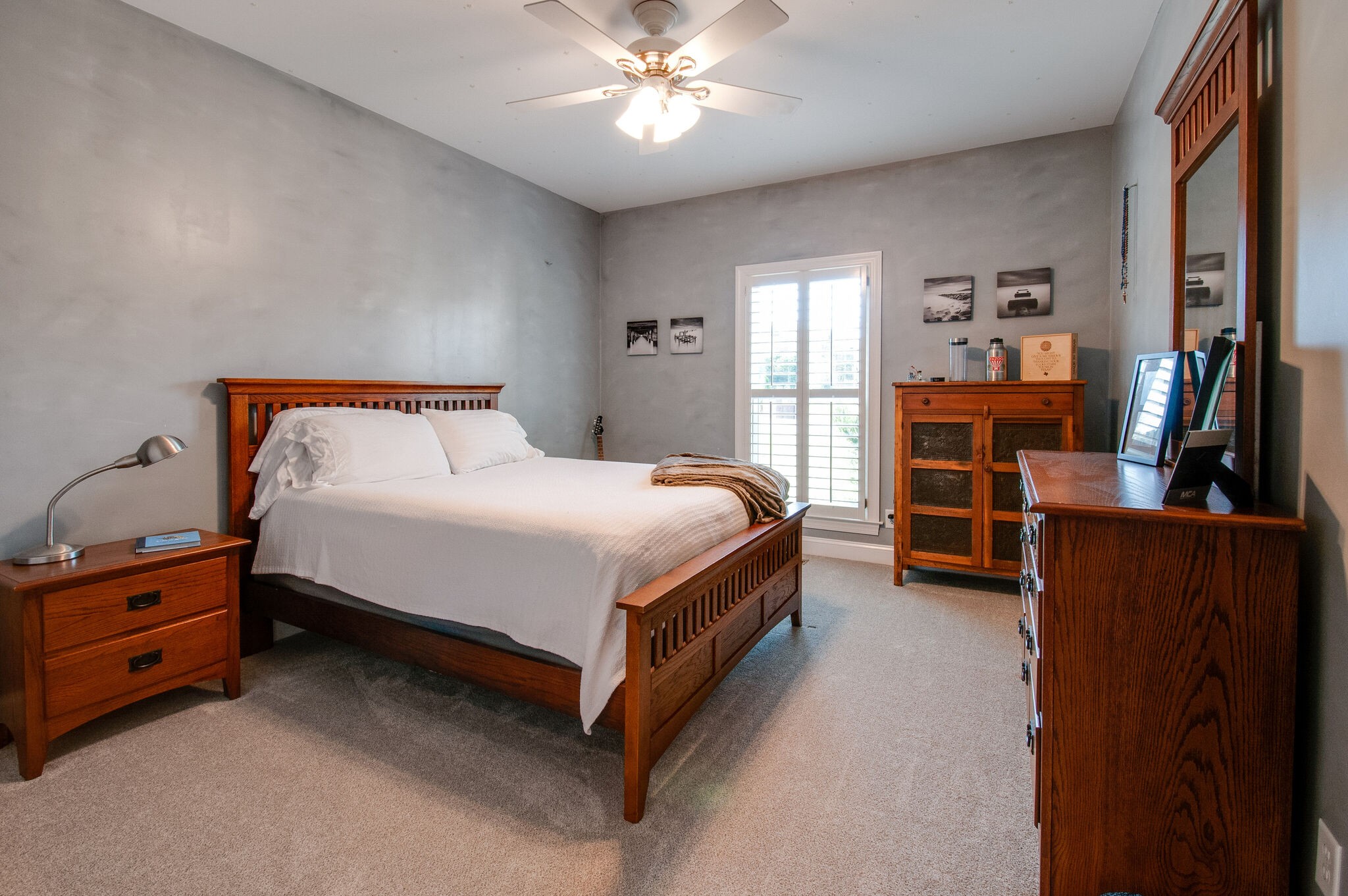 200 Ridgewater Way Mount Juliet, TN 37122 - Photo 25 of 37 a bedroom with a bed and a chandelier