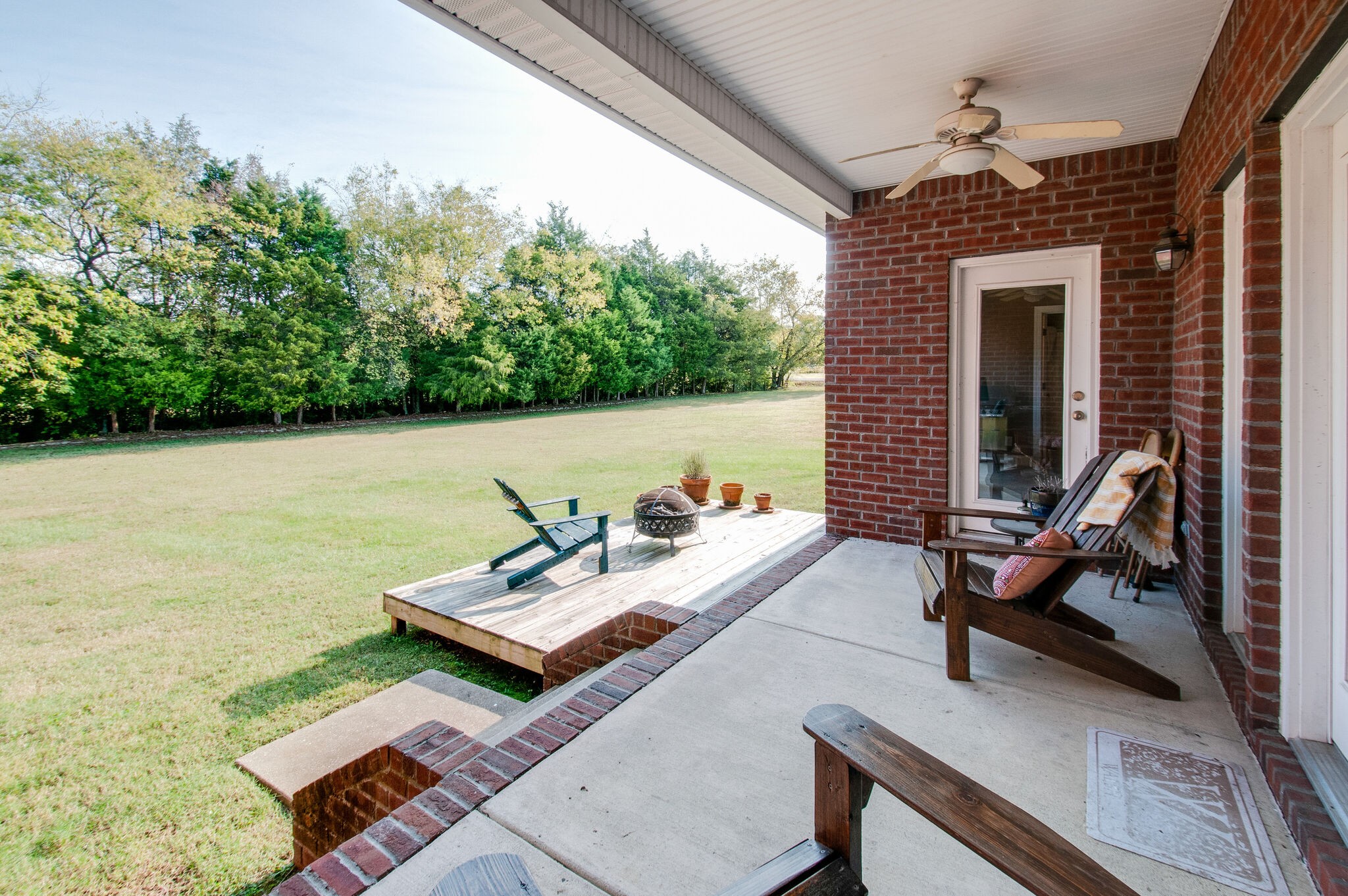 200 Ridgewater Way Mount Juliet, TN 37122 - Photo 33 of 37 a roof deck with table and chairs and potted plants