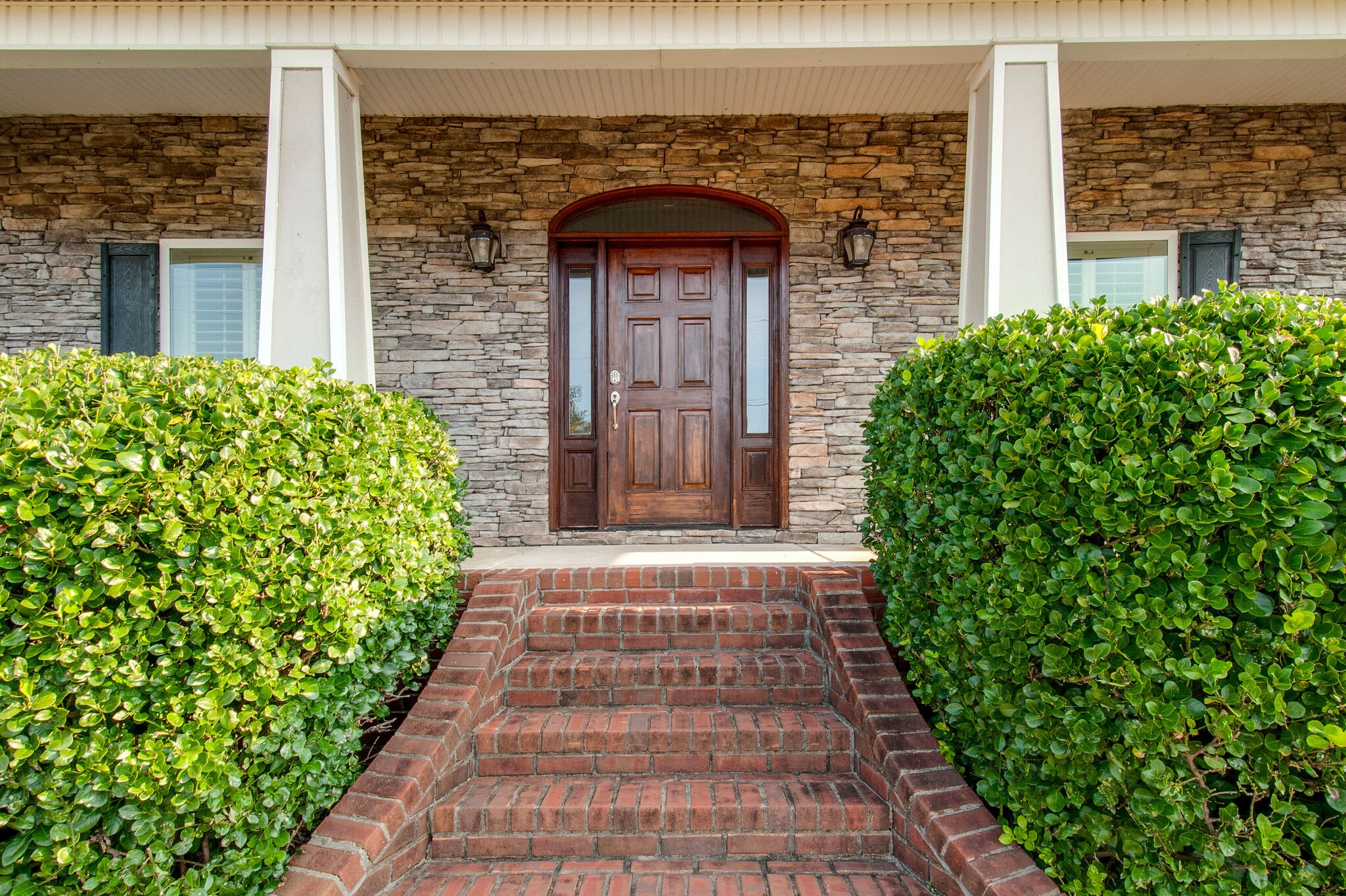 200 Ridgewater Way Mount Juliet, TN 37122 - Photo 6 of 37 a front view of a house with a lots of plants