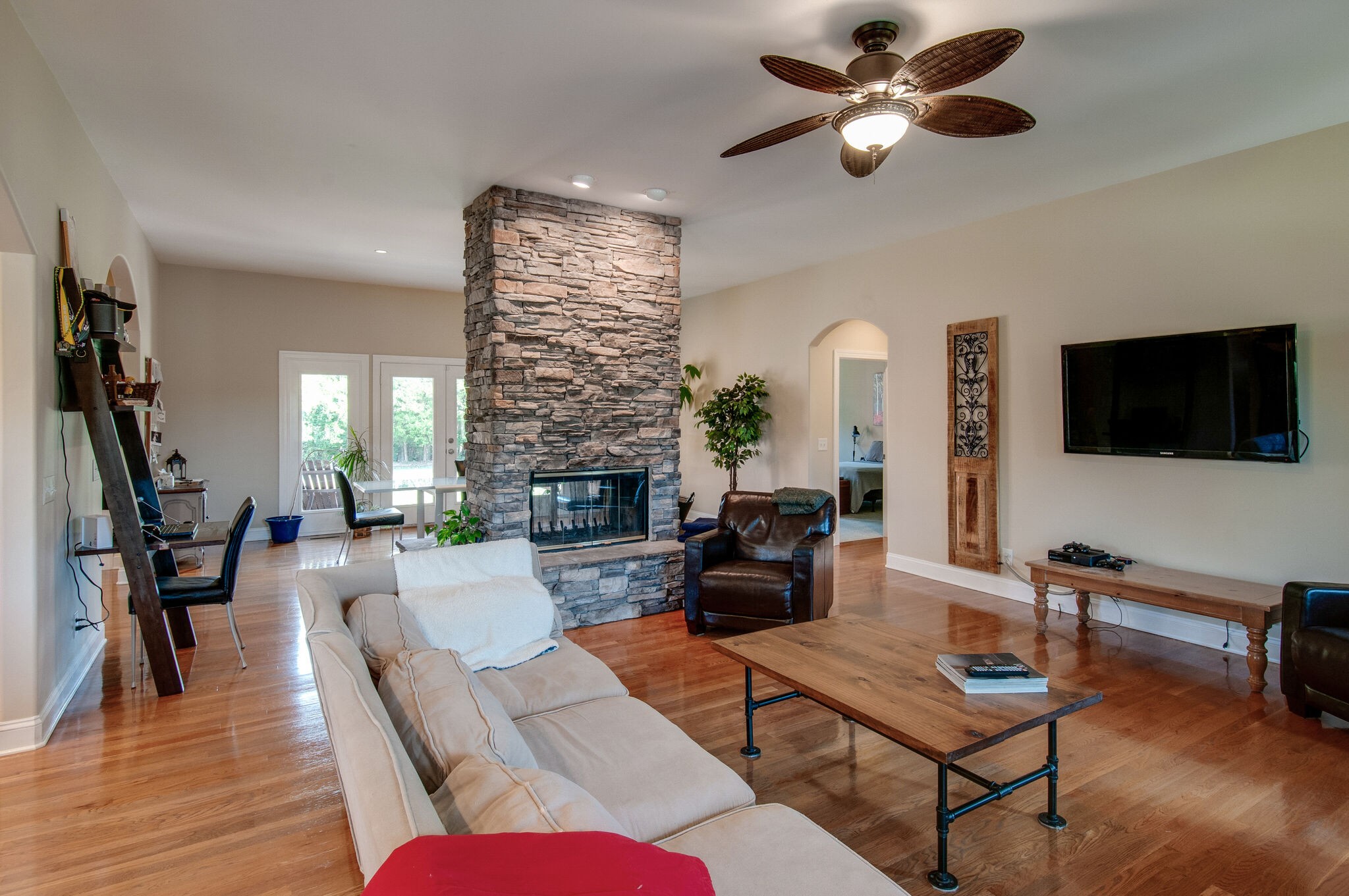 200 Ridgewater Way Mount Juliet, TN 37122 - Photo 7 of 37 a living room with furniture and a flat screen tv with wooden floor