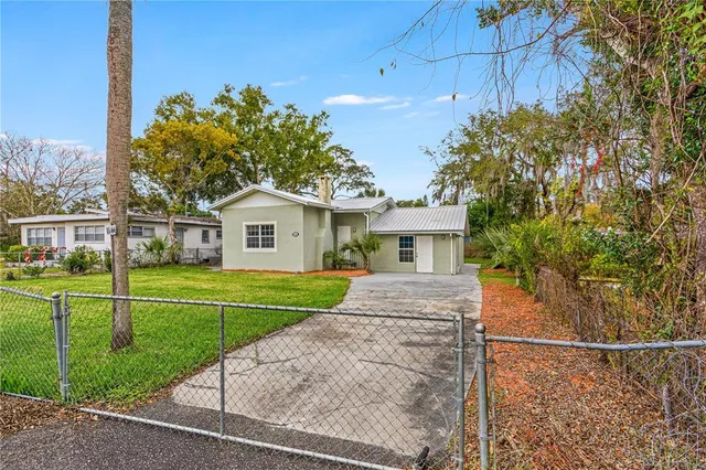 a house view with a garden space