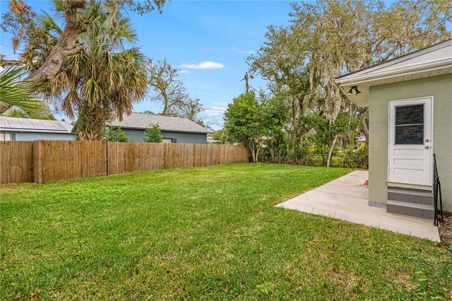 a view of a backyard with a garden