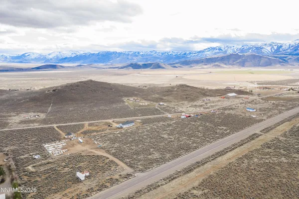 a view of an ocean and a mountain