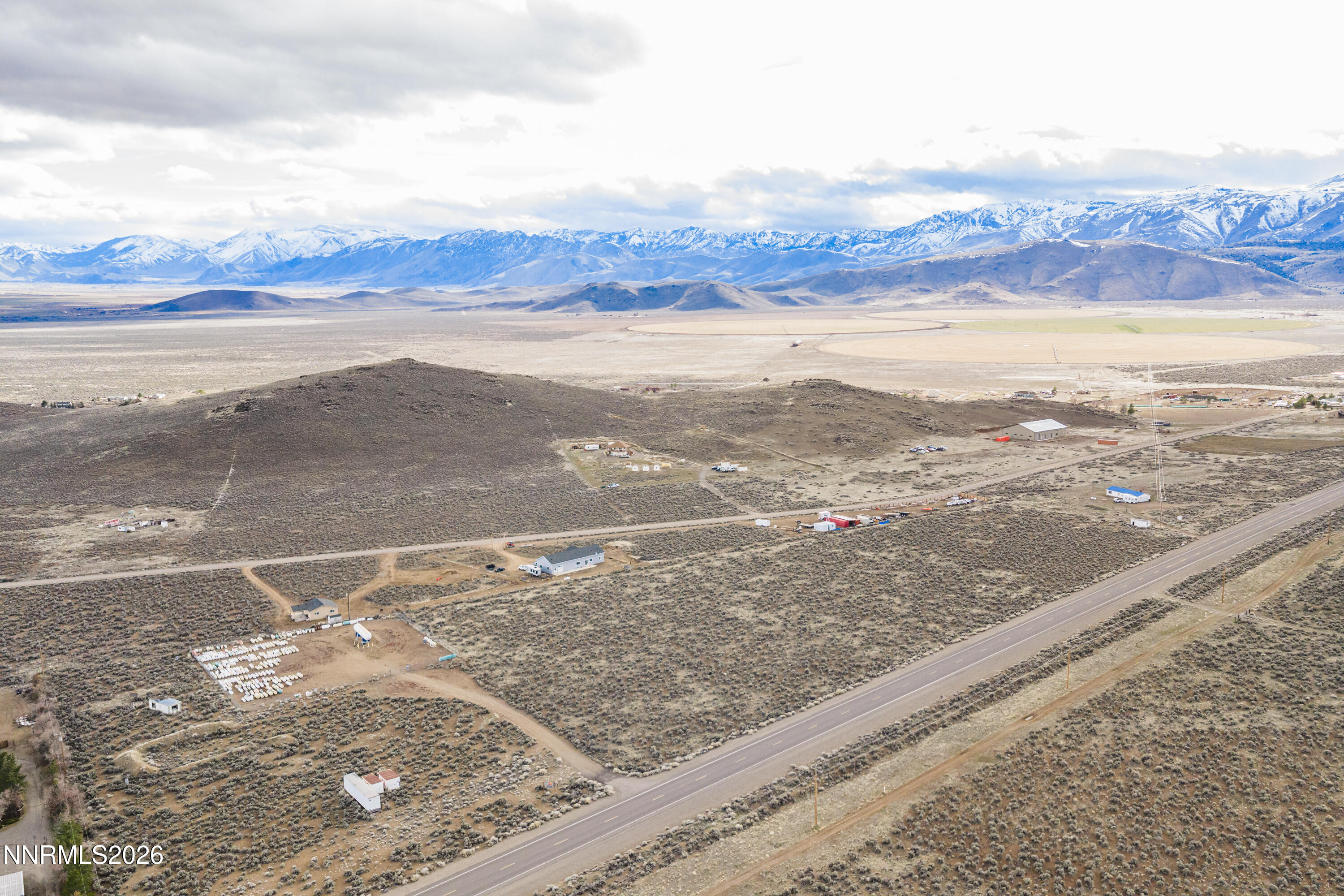 a view of an ocean and a mountain