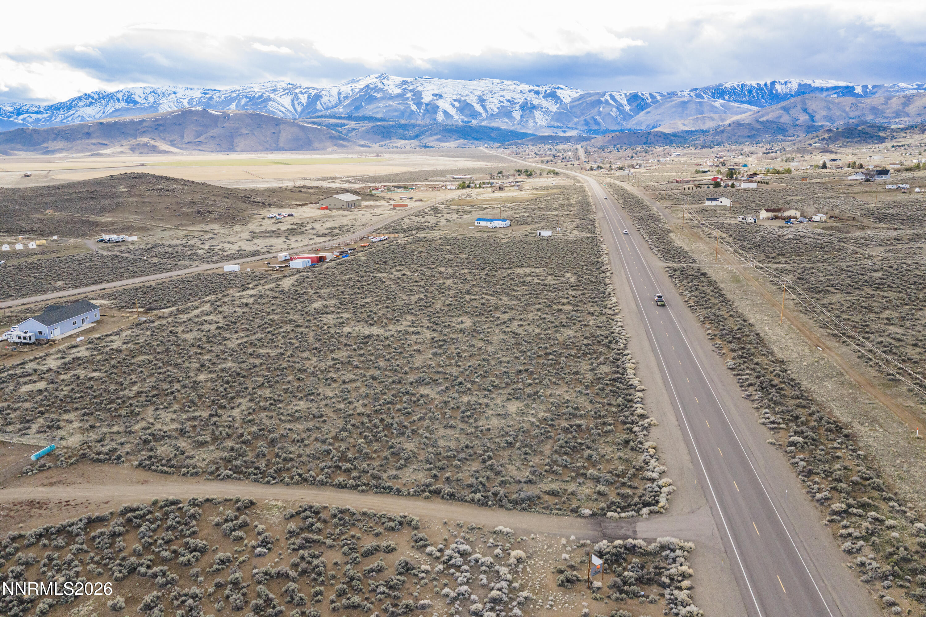 4221 Highway 208 Topaz Ranch Estates, NV 89444 - Photo 22 of 29 a view of an ocean beach and mountain