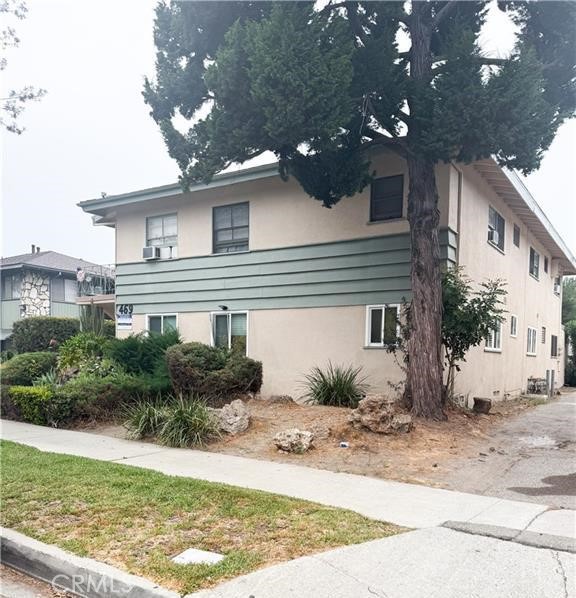 469 East Algrove Street, Unit 1 Covina, CA 91723 - Photo 2 of 4 a front view of a house with garden