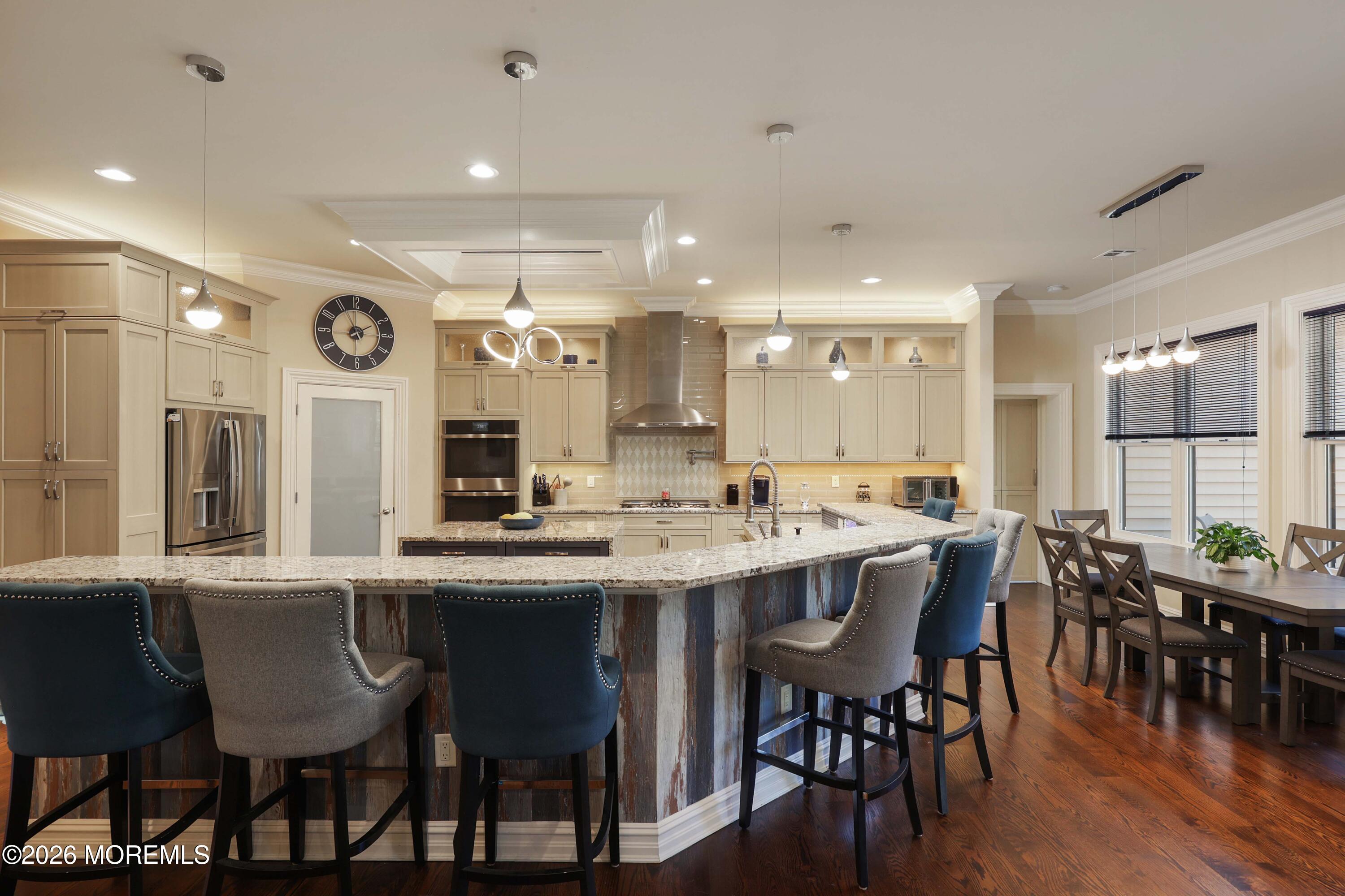 786 Holly Berry Lane Brick, NJ 08724 - Photo 13 of 52 a large kitchen with a table and chairs