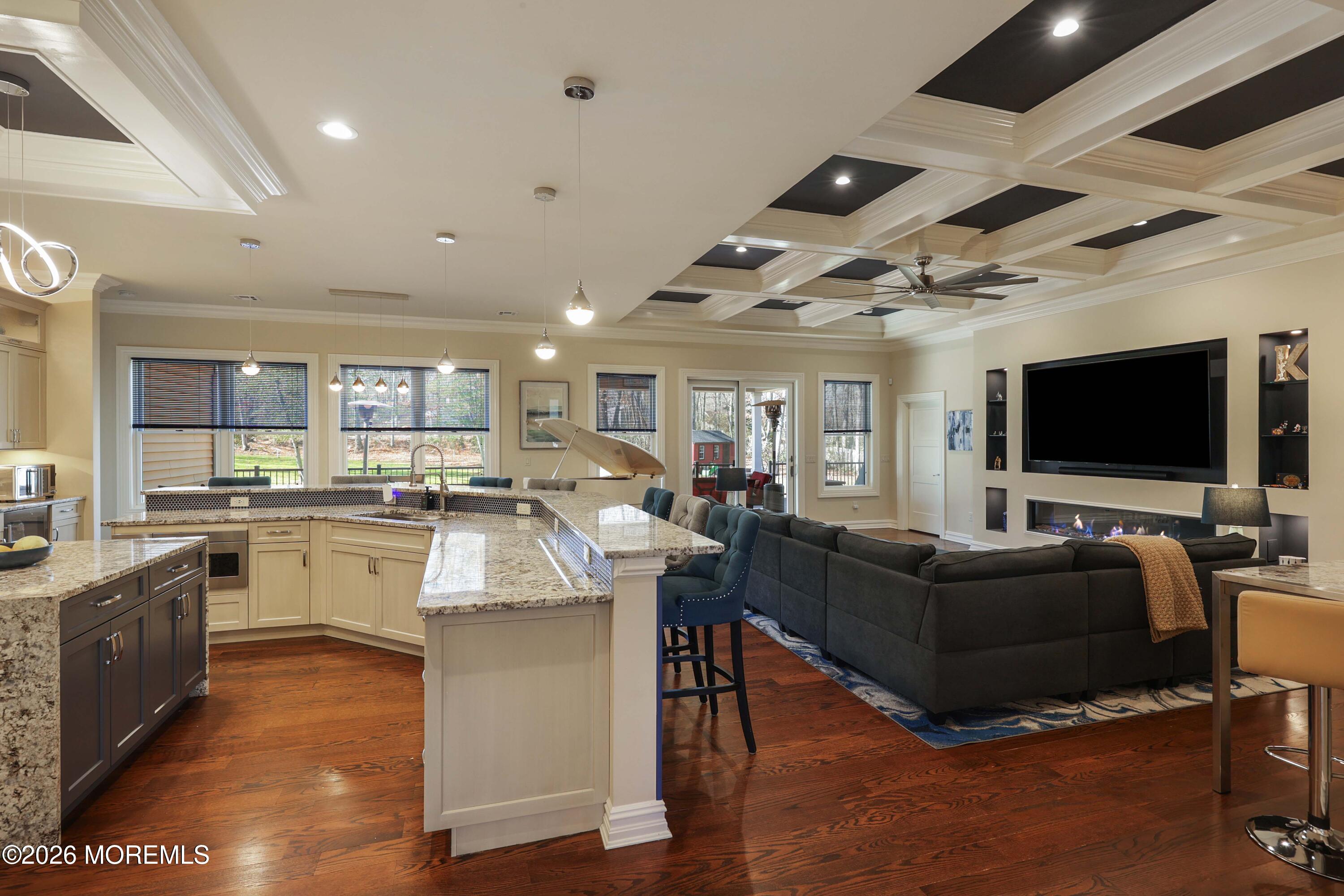 786 Holly Berry Lane Brick, NJ 08724 - Photo 3 of 52 a living room with stainless steel appliances furniture and a flat screen tv
