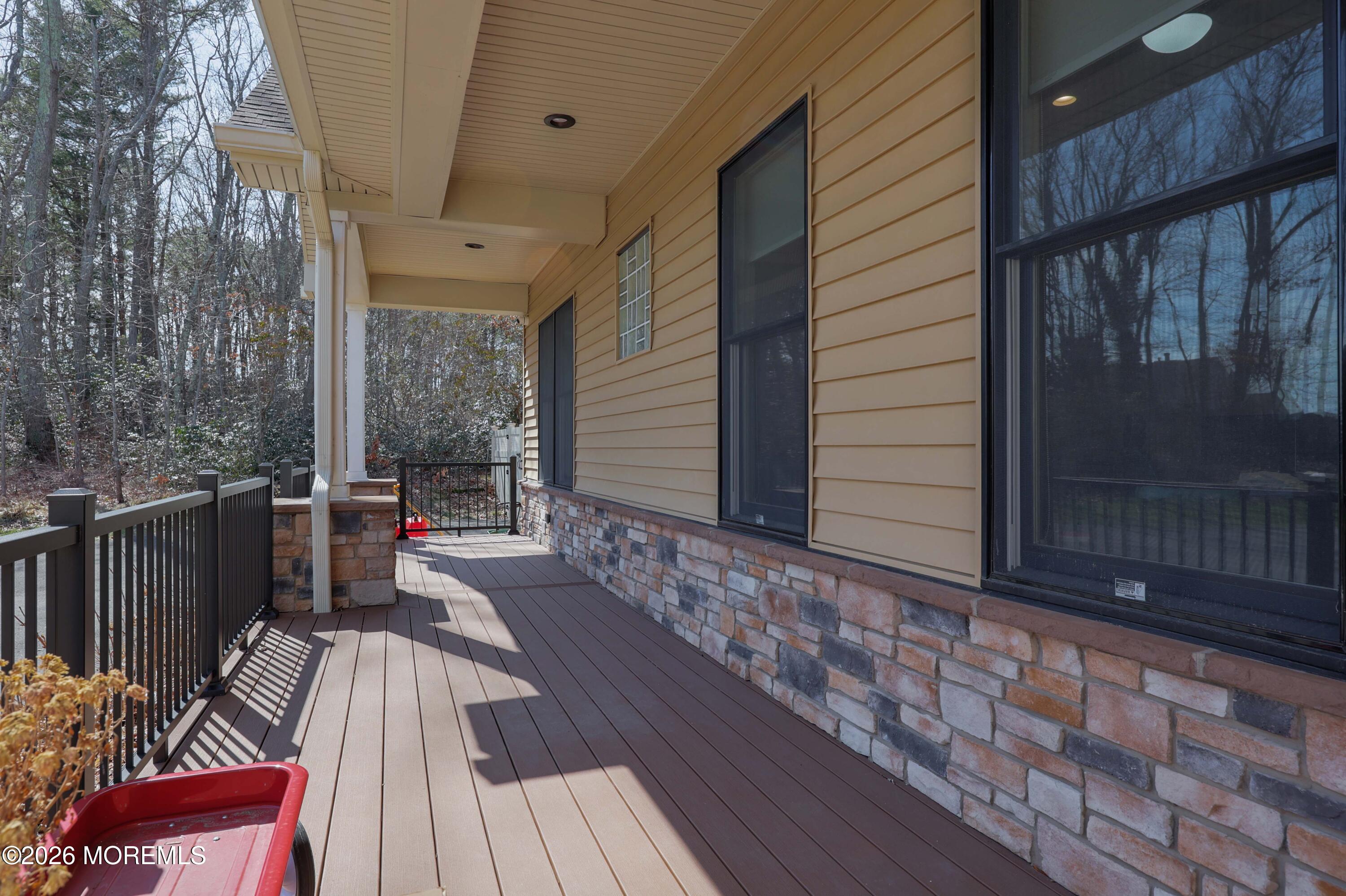 786 Holly Berry Lane Brick, NJ 08724 - Photo 45 of 52 a view of balcony with wooden floor and outdoor seating