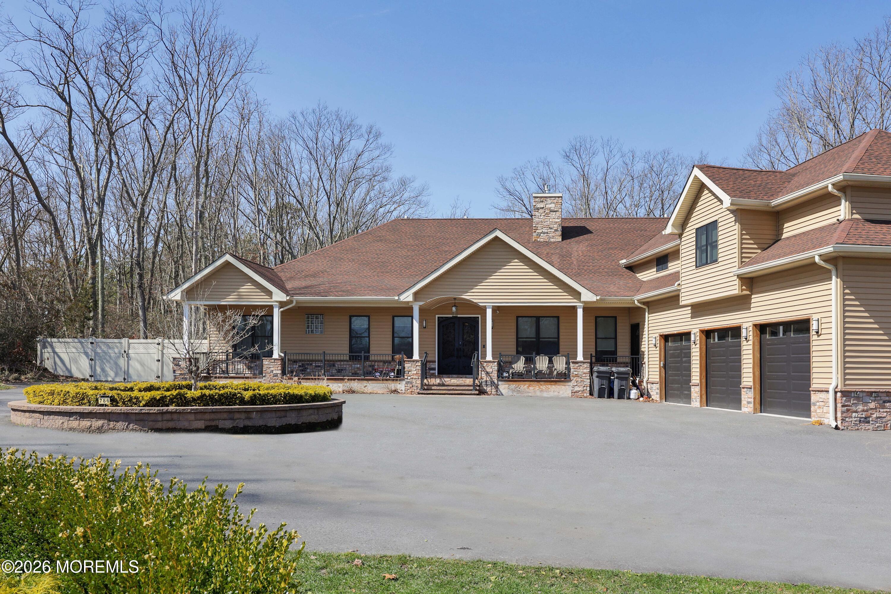 786 Holly Berry Lane Brick, NJ 08724 - Photo 48 of 52 a front view of a house with swimming pool and porch