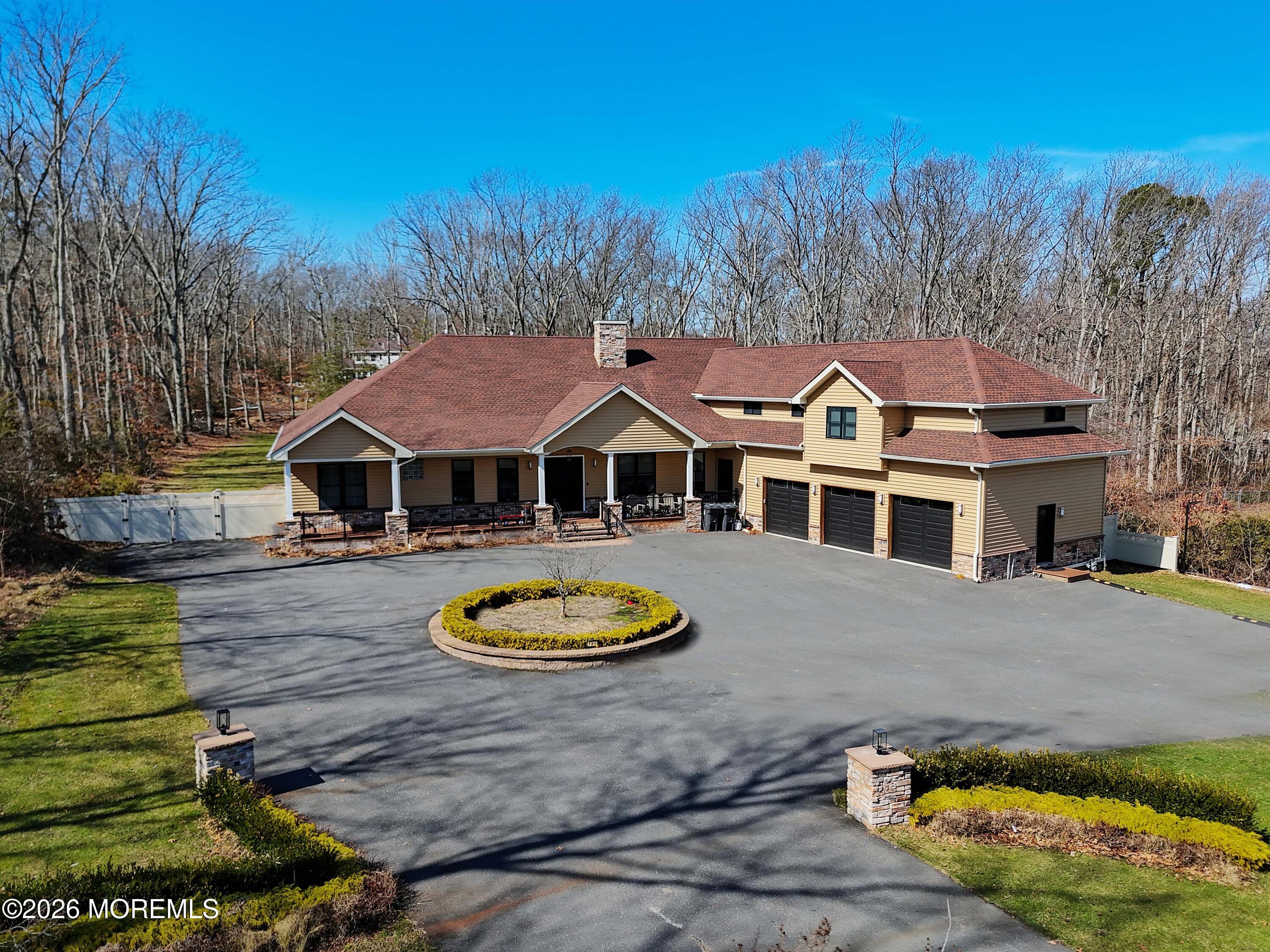 786 Holly Berry Lane Brick, NJ 08724 - Photo 49 of 52 a view of a white house with a swimming pool and a yard