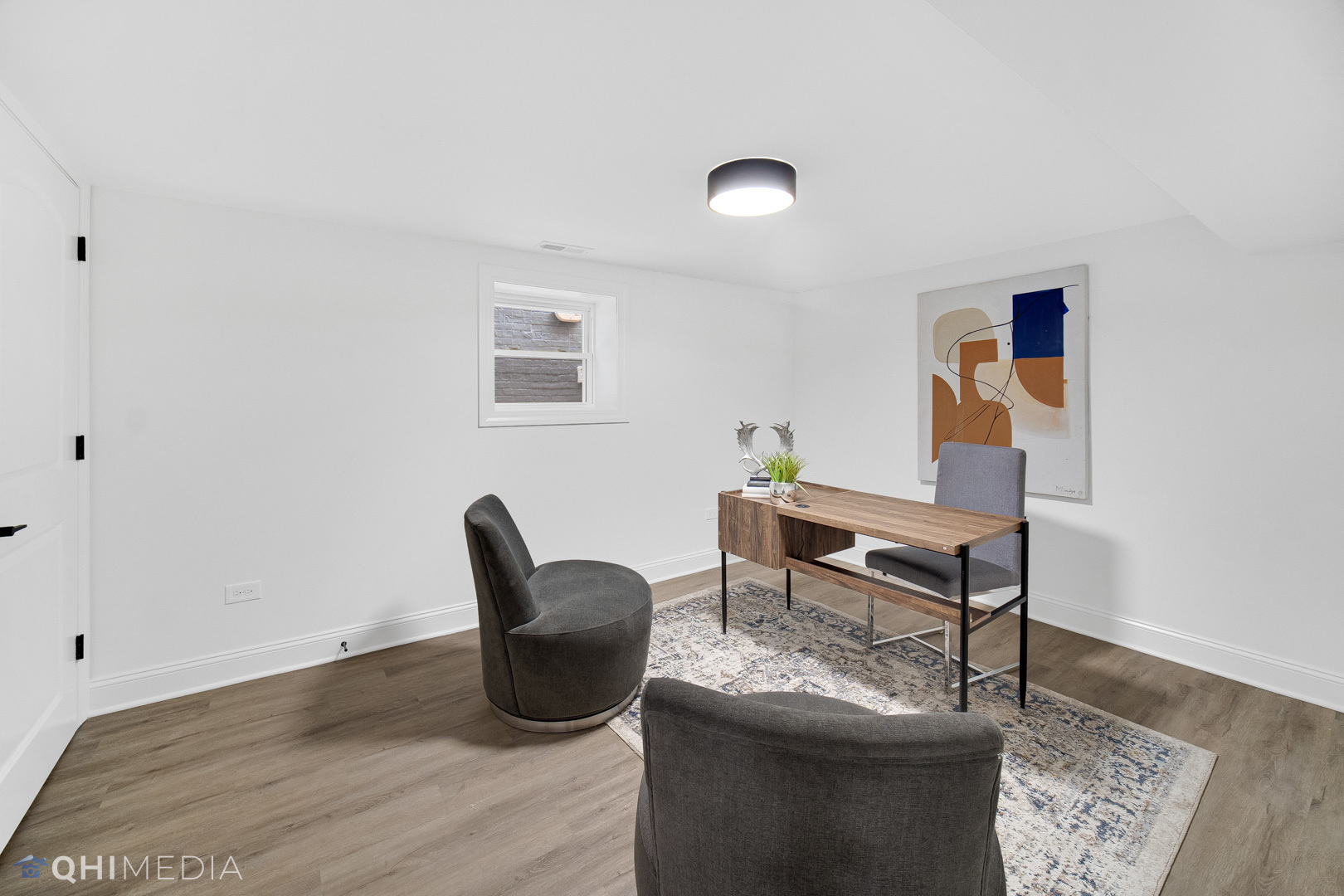 5459 West Grace Street Chicago, IL 60641 - Photo 24 of 24 a living room with furniture and a wooden floor