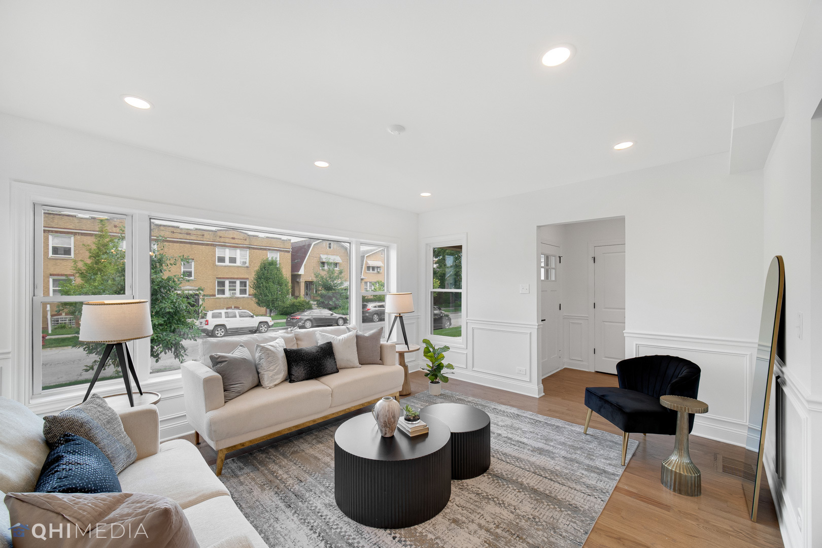 5459 West Grace Street Chicago, IL 60641 - Photo 3 of 24 a living room with furniture and a large window