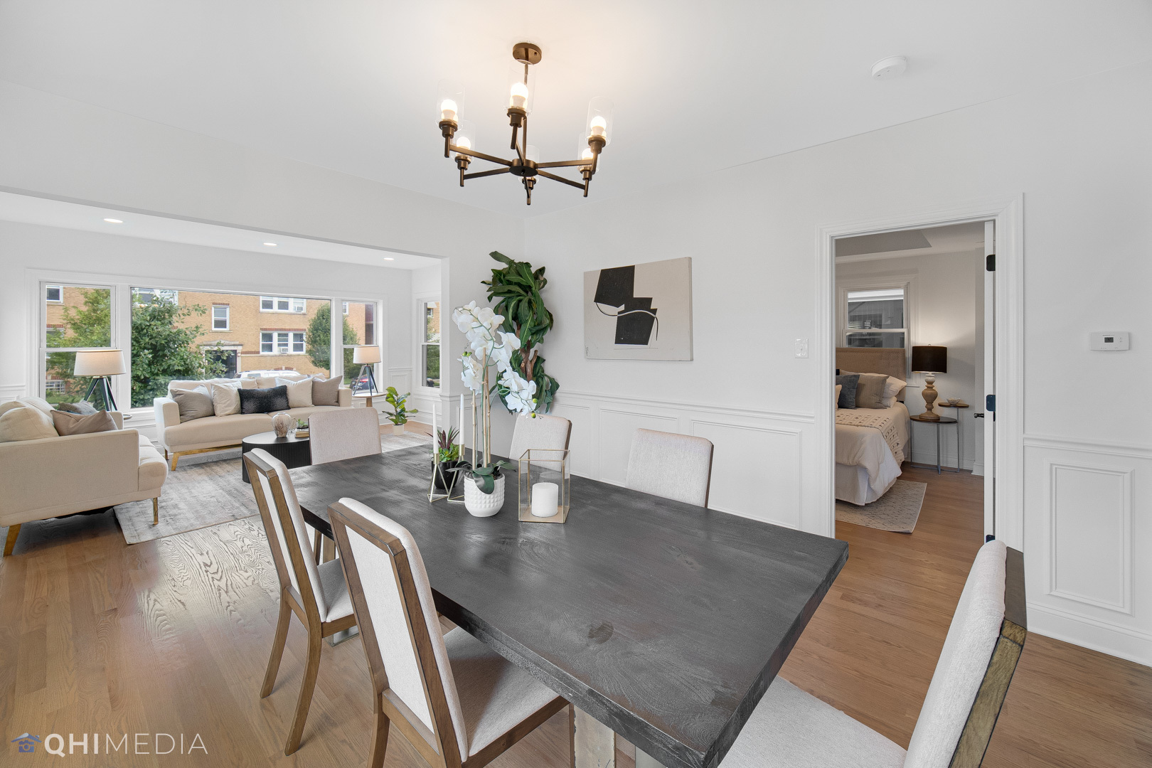 5459 West Grace Street Chicago, IL 60641 - Photo 5 of 24 a living room with furniture and a floor to ceiling window