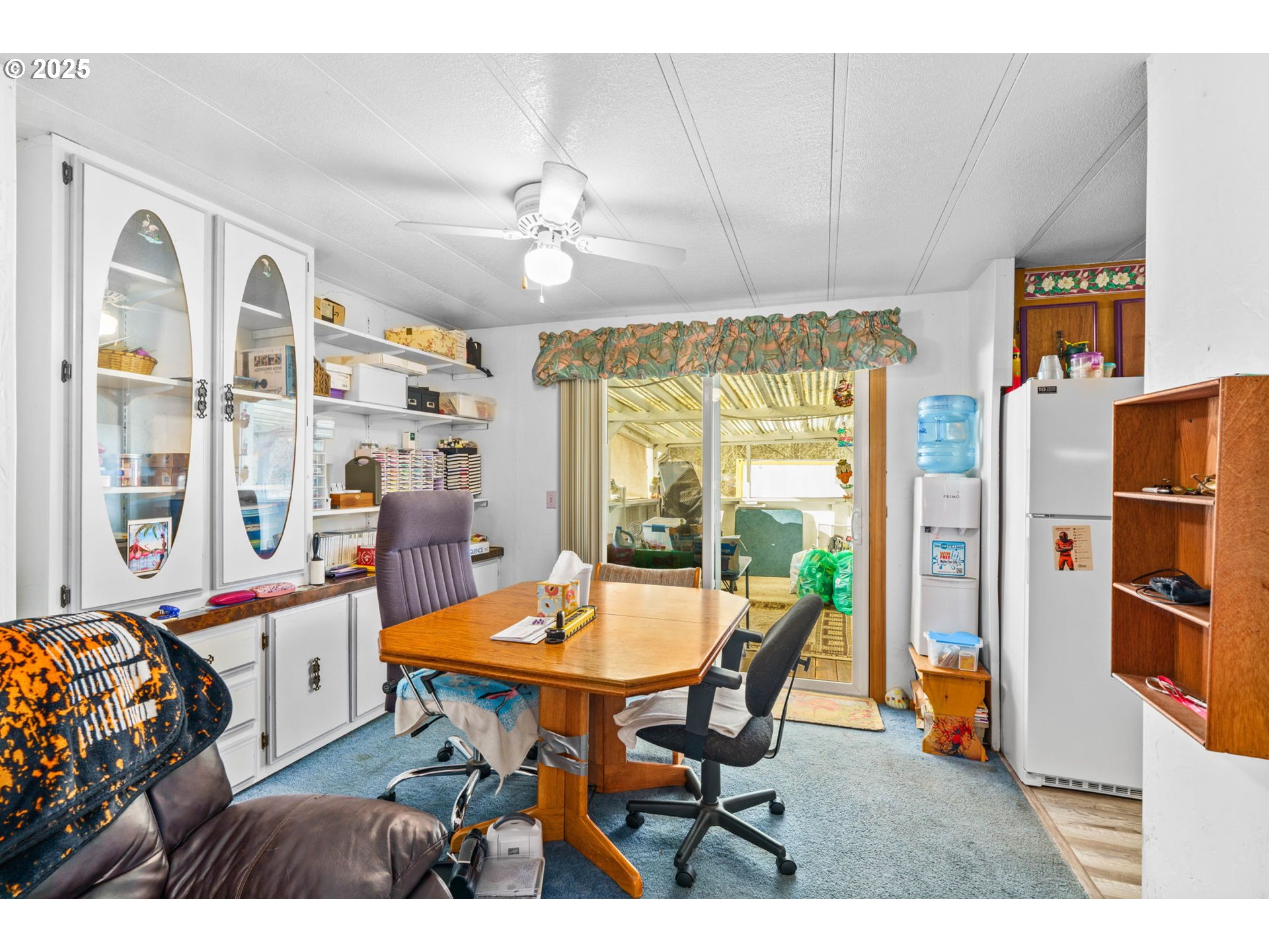 82966 Minnick Road Dexter, OR 97431 - Photo 13 of 29 a view of a dining room with furniture window and outside view