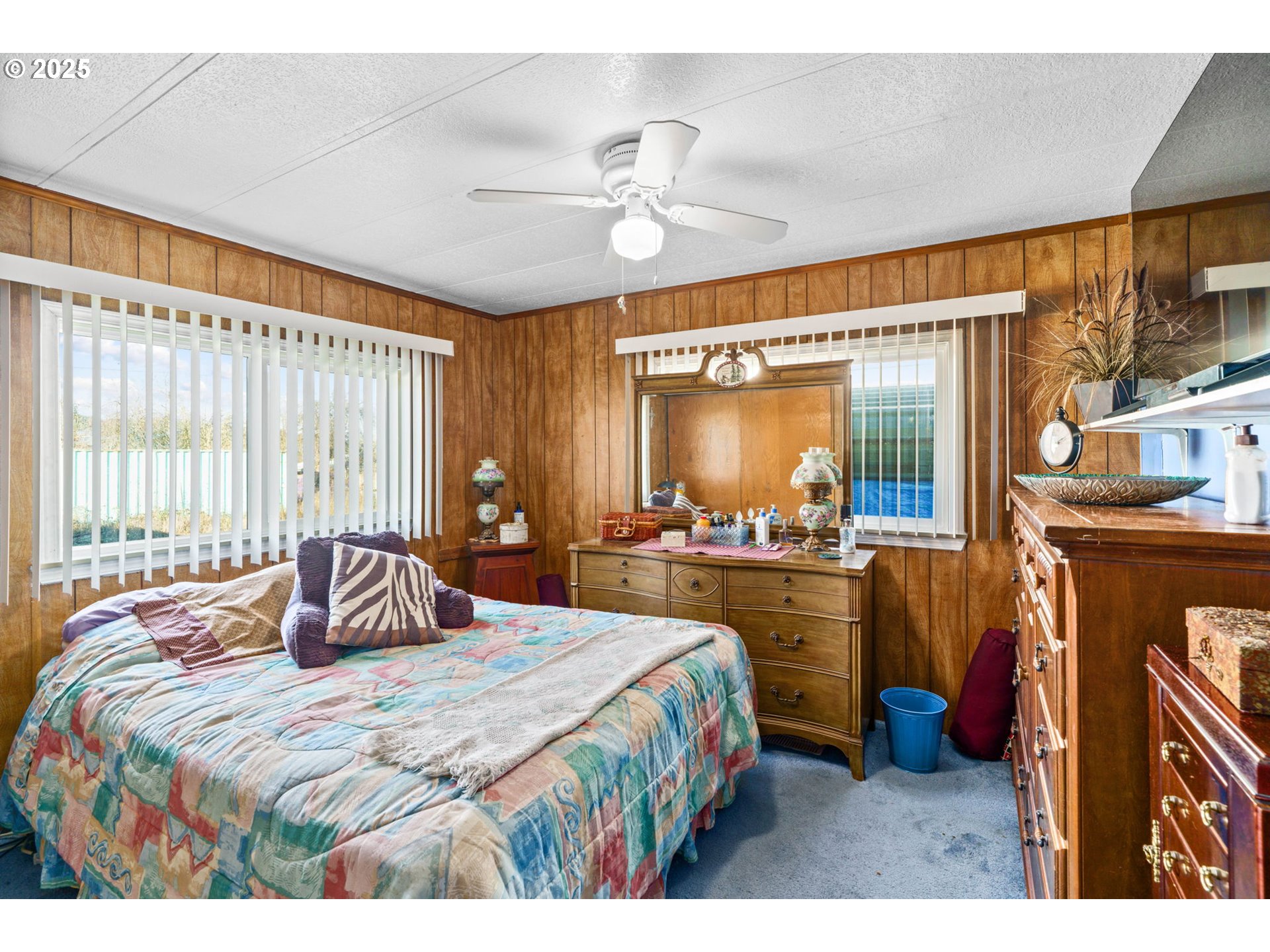 82966 Minnick Road Dexter, OR 97431 - Photo 23 of 29 a bedroom with a bed and a large mirror