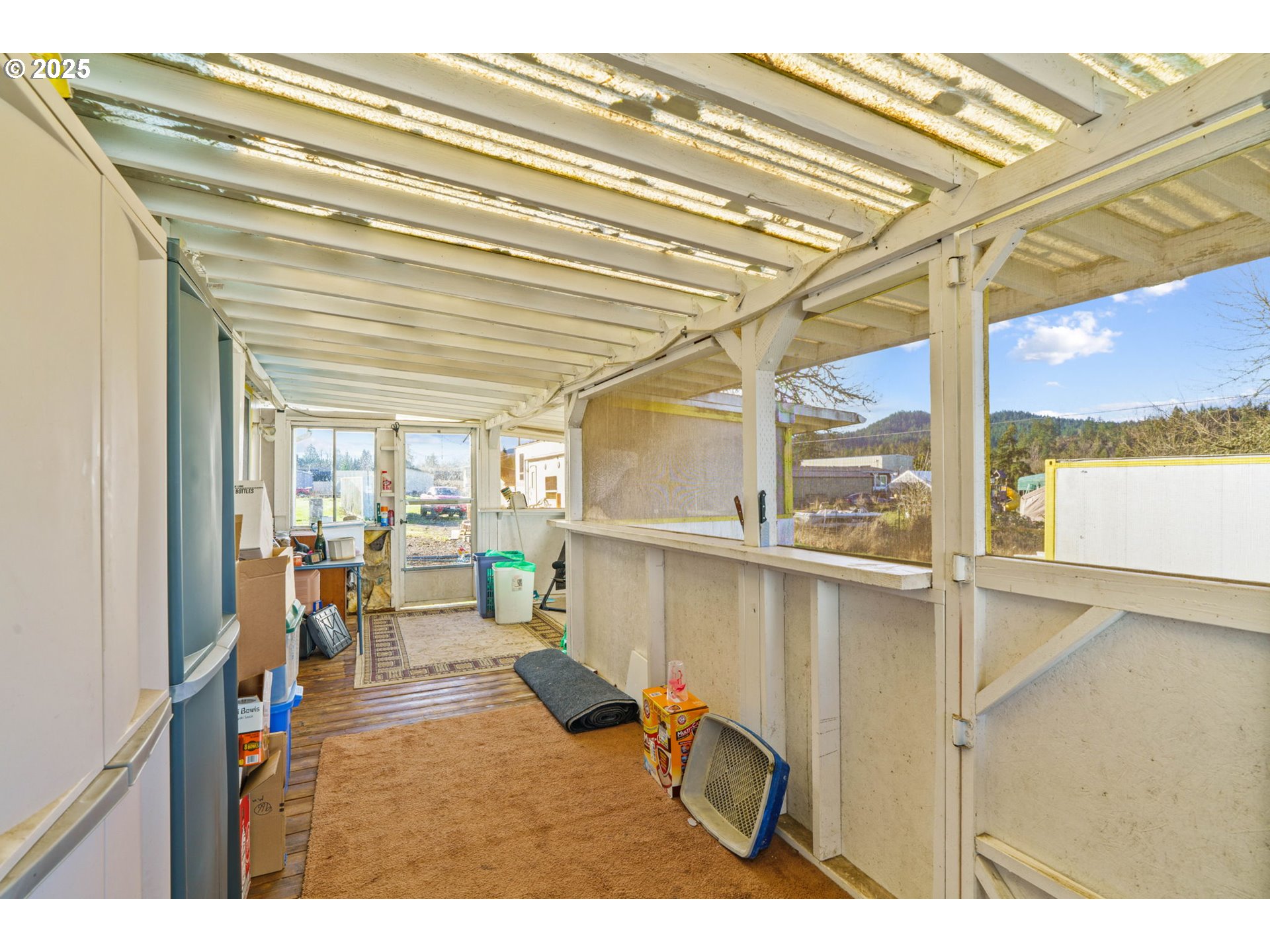 82966 Minnick Road Dexter, OR 97431 - Photo 25 of 29 a view of a living room and a window