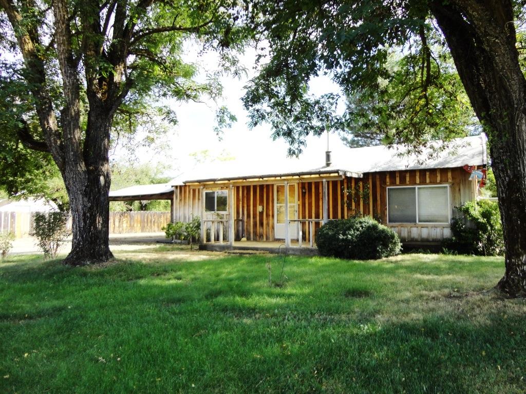 140 Riverview Road Hayfork, CA 96041 - Photo 1 of 21 a front view of a house with yard and green space