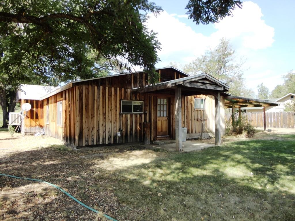 140 Riverview Road Hayfork, CA 96041 - Photo 17 of 21 a front view of a house with a garden