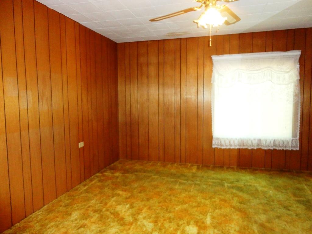 140 Riverview Road Hayfork, CA 96041 - Photo 4 of 21 a view of an empty room with a window