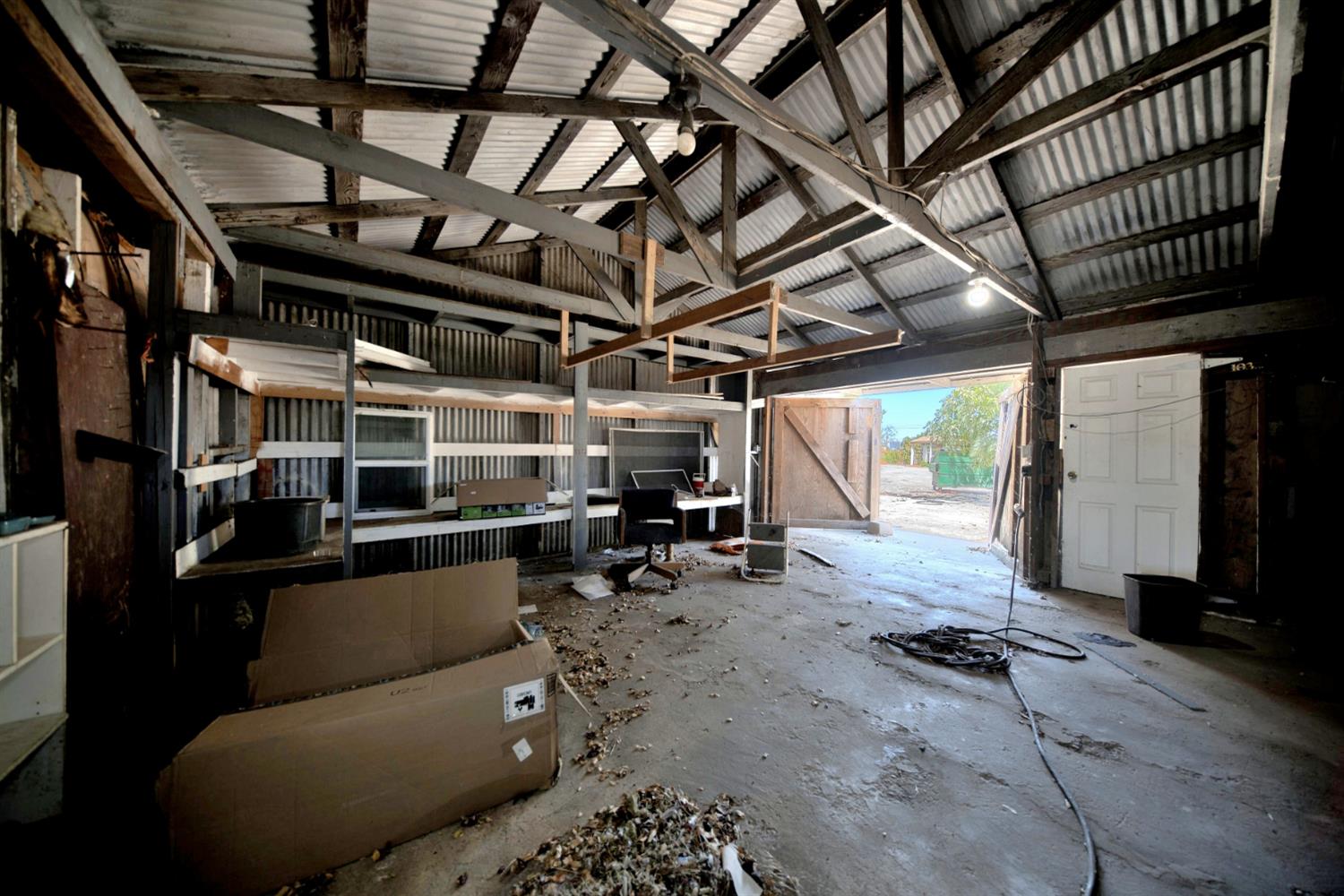 7878 West Howard Road Stockton, CA 95206 - Photo 86 of 96 Barn with lighting and large doors/cement flooring