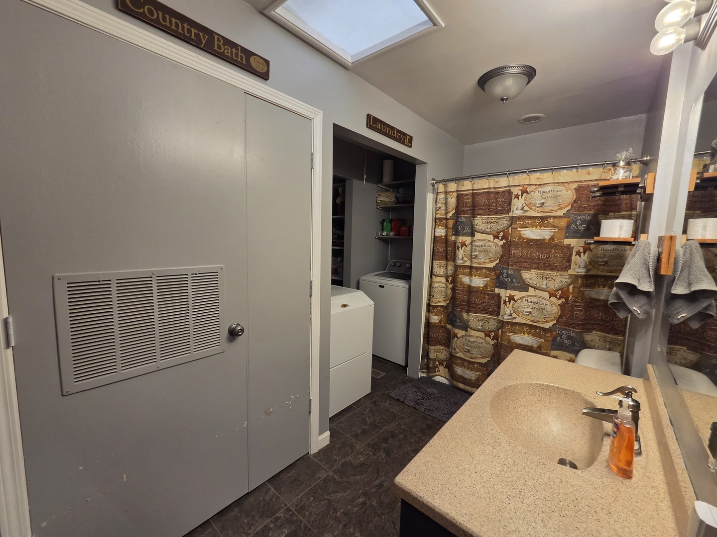 1000 West McKinley Road Ottawa, IL 61350 - Photo 18 of 19 a bathroom with a sink and mirror