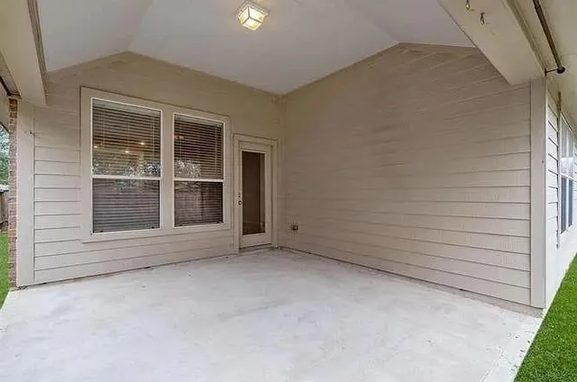 an empty room with windows