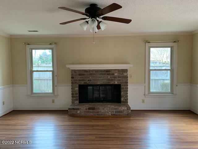 1861 Quail Ridge Road, Unit A Greenville, NC 27858 - Photo 16 of 33 Bamboo flooring in this den with gas logs (propane tanks included)