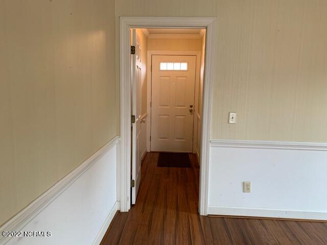 1861 Quail Ridge Road, Unit A Greenville, NC 27858 - Photo 19 of 33 Access the side entrance from the den, passing by the laundry room.