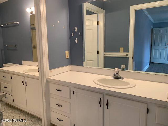1861 Quail Ridge Road, Unit A Greenville, NC 27858 - Photo 30 of 33 His and Her vanities with walk-in shower