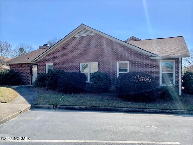 1861 Quail Ridge Road, Unit A Greenville, NC 27858 - Photo 3 of 33 Not only do you have a front parking space for guests, you can park at side entrance and unload groceries in a snap.