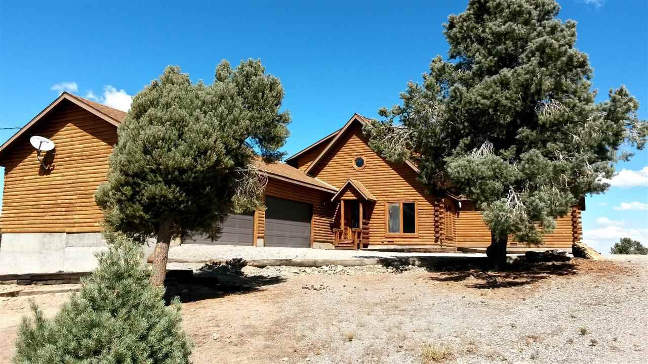 21510 Delta Drive Reno, NV 89521 - Photo 1 of 1 a view of a house with snow on the road