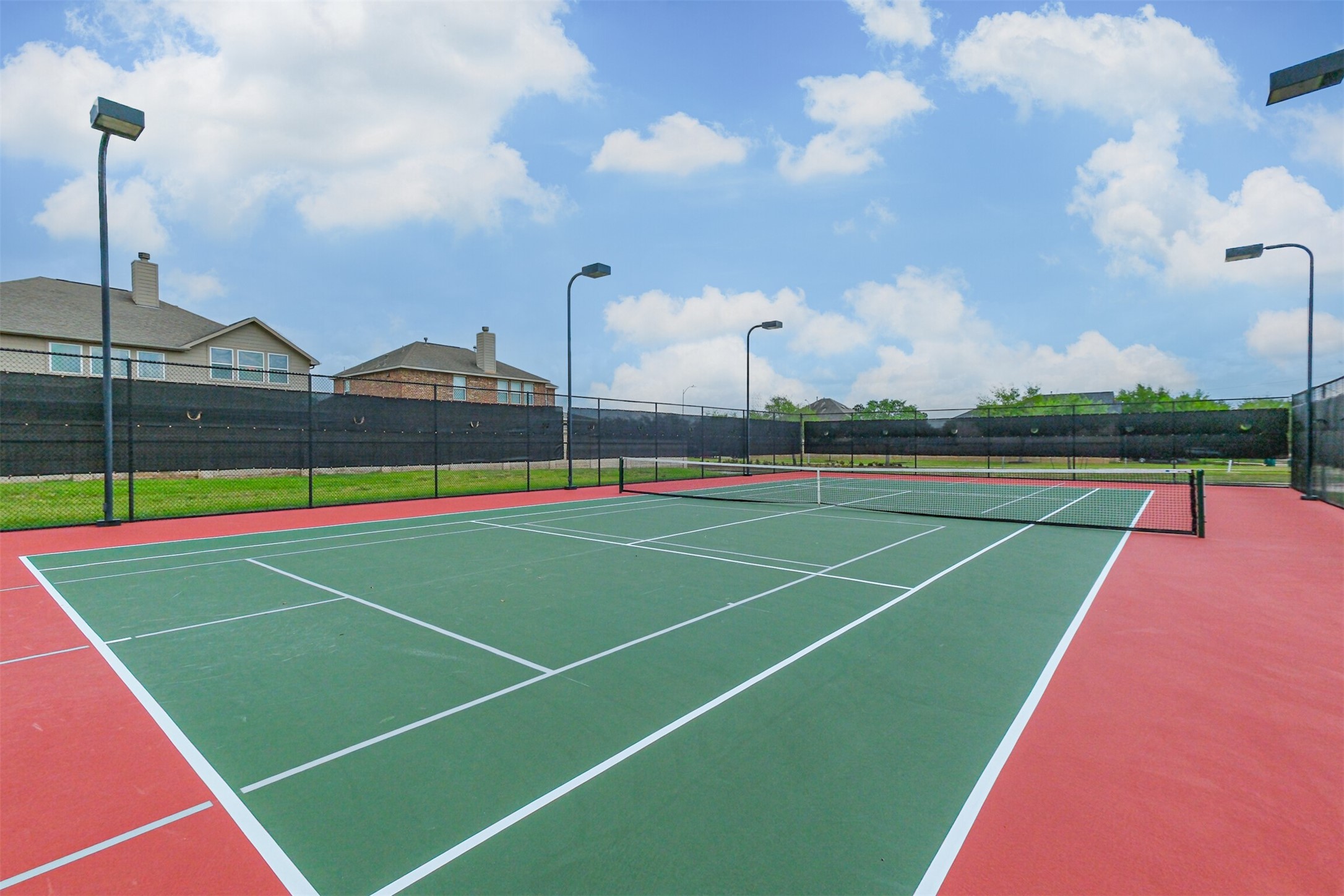 9438 Gold Mountain Drive Rosharon, TX 77583 - Photo 25 of 25 a view of a tennis court