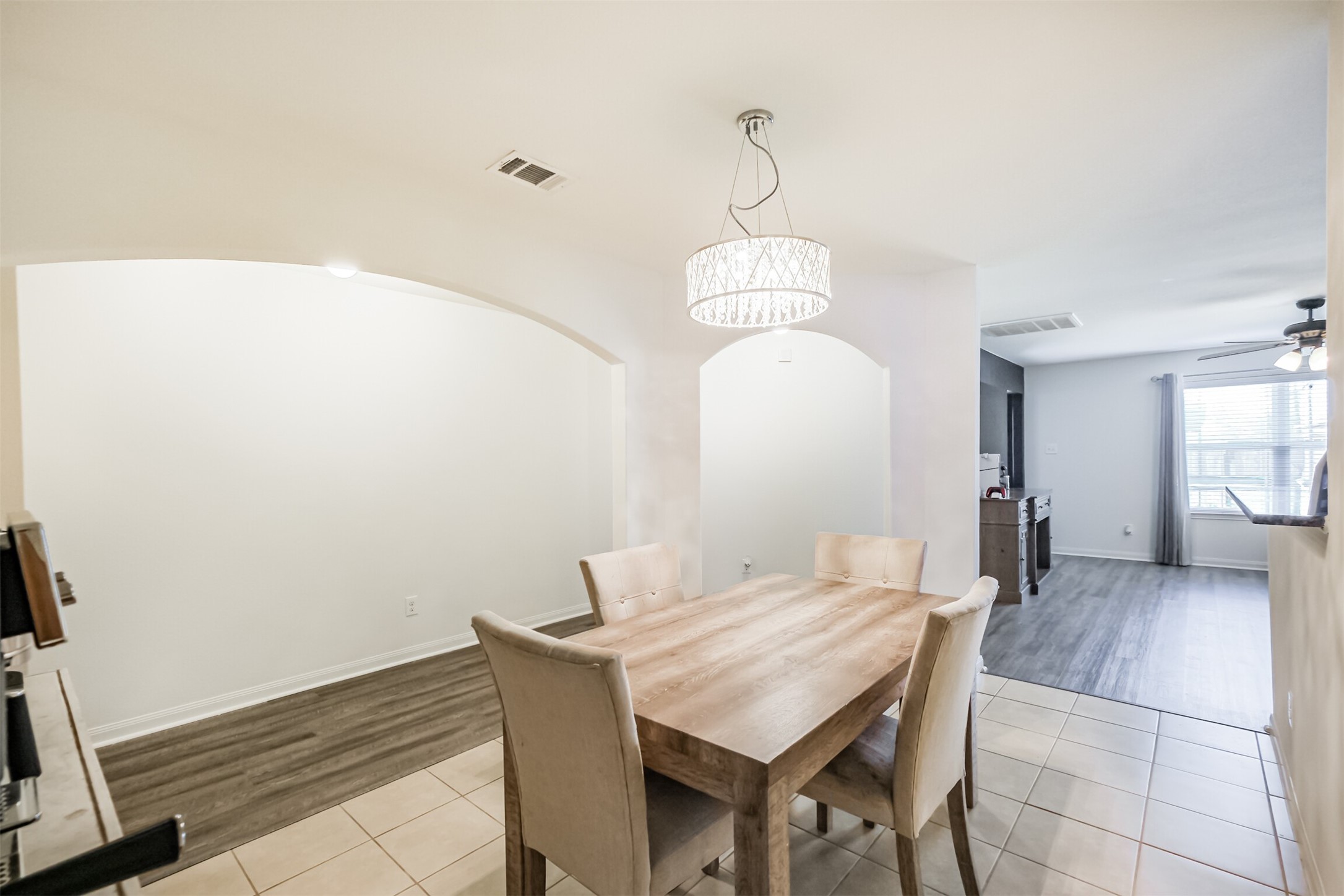 9438 Gold Mountain Drive Rosharon, TX 77583 - Photo 4 of 25 a view of a dining room with furniture