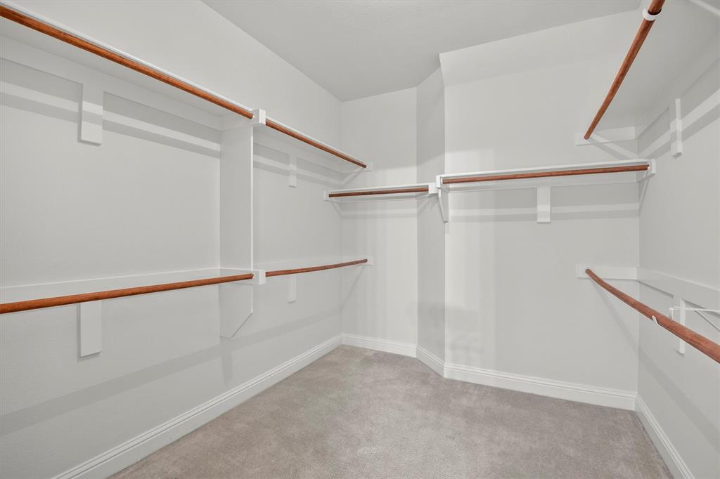 2610 Meadow Ridge Drive Prosper, TX 75078 - Photo 23 of 32 a view of an empty walk in closet