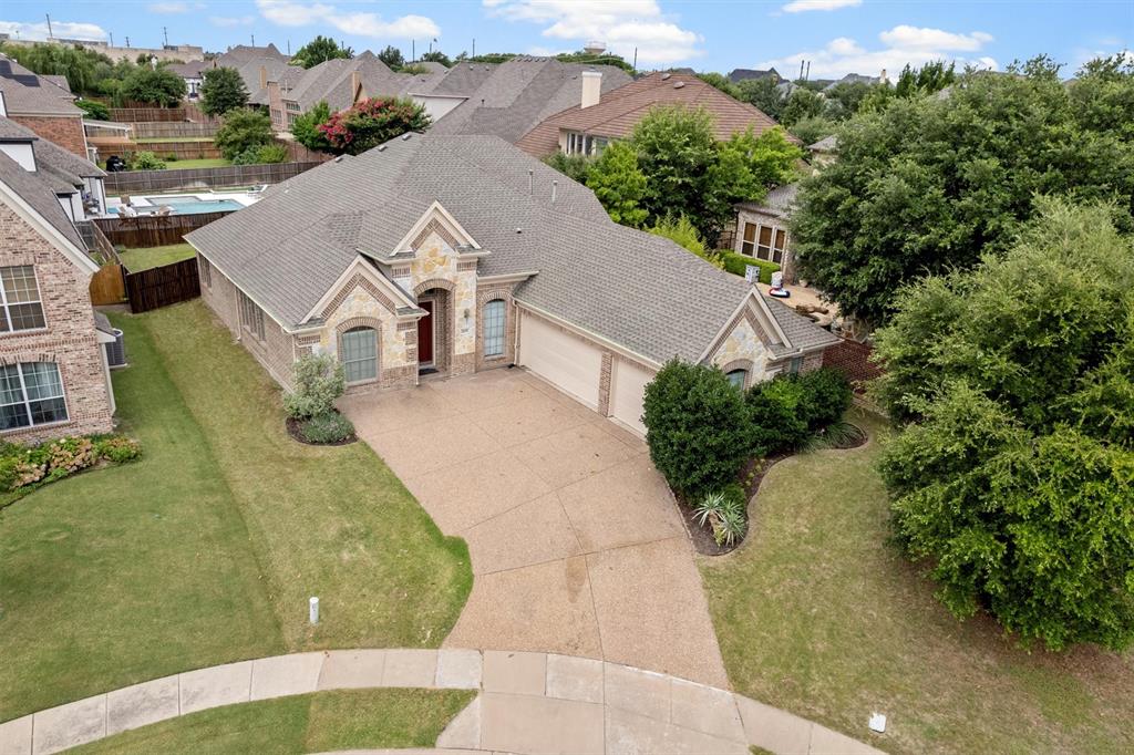 2610 Meadow Ridge Drive Prosper, TX 75078 - Photo 4 of 32 an aerial view of a house with a yard
