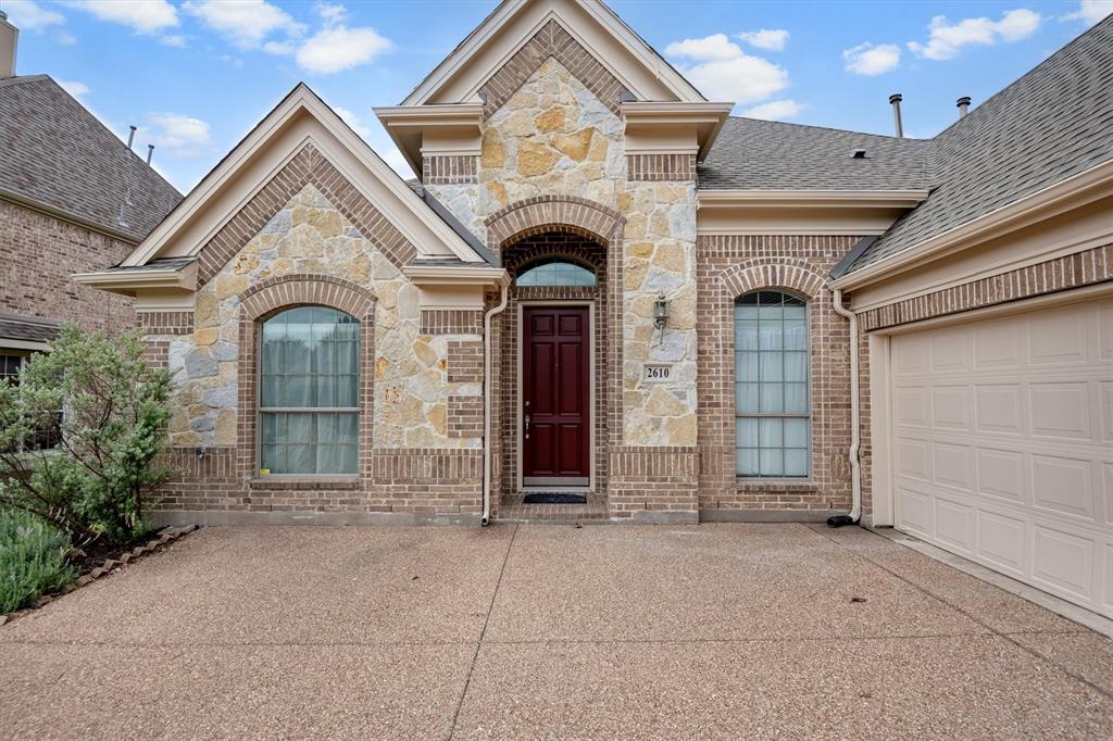 2610 Meadow Ridge Drive Prosper, TX 75078 - Photo 7 of 32 a view of a house with entrance gate