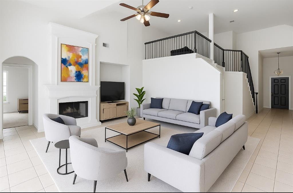 2610 Meadow Ridge Drive Prosper, TX 75078 - Photo 9 of 32 a living room with furniture and a flat screen tv