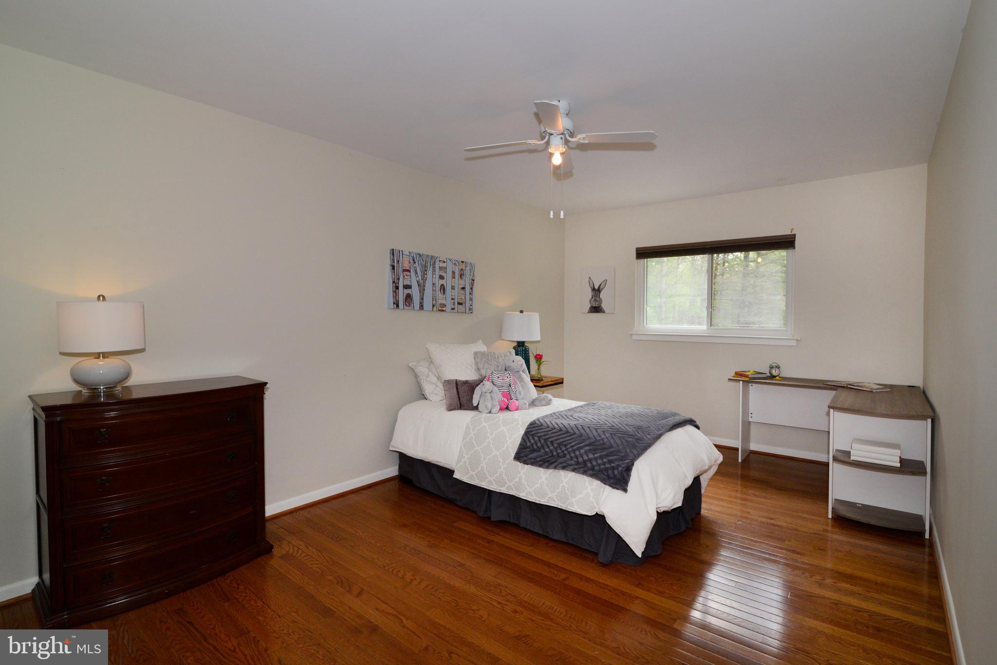 11086 Glade Court Reston, VA 20191 - Photo 31 of 44 Bedroom #2 has hardwood floors and a ceiling fan.