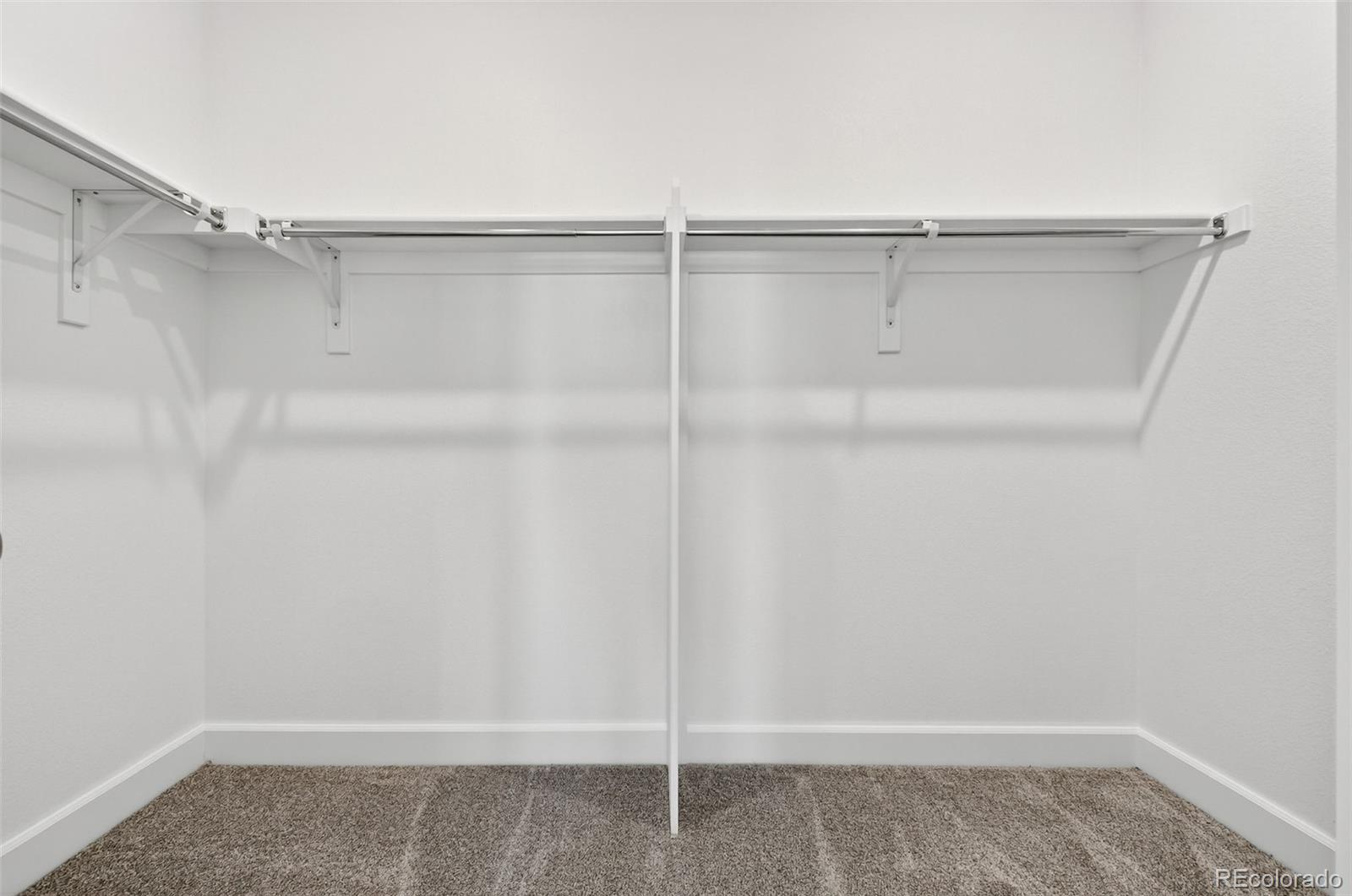 17095 West 92nd Loop Arvada, CO 80007 - Photo 18 of 37 a view of an empty walk in closet