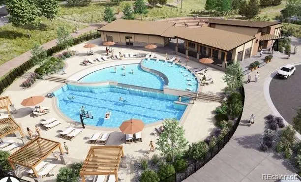 an aerial view of a house with a swimming pool