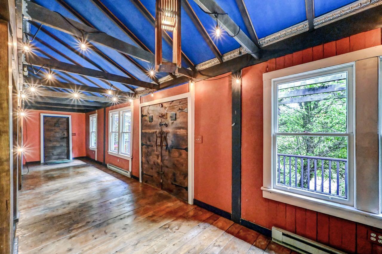 2285 Bear Town Road Canadensis, PA 18325 - Photo 15 of 58 a view of an empty room with wooden floor