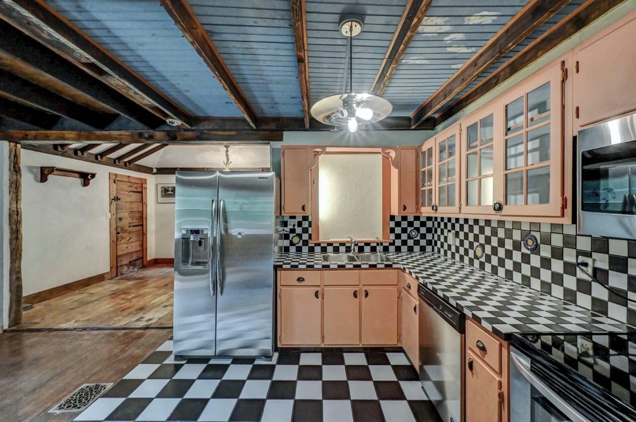 2285 Bear Town Road Canadensis, PA 18325 - Photo 27 of 58 a kitchen with a sink a counter and cabinets