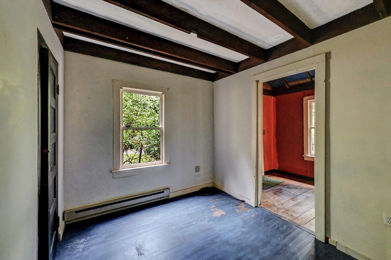 2285 Bear Town Road Canadensis, PA 18325 - Photo 30 of 58 a view of an empty room with wooden floor and a window