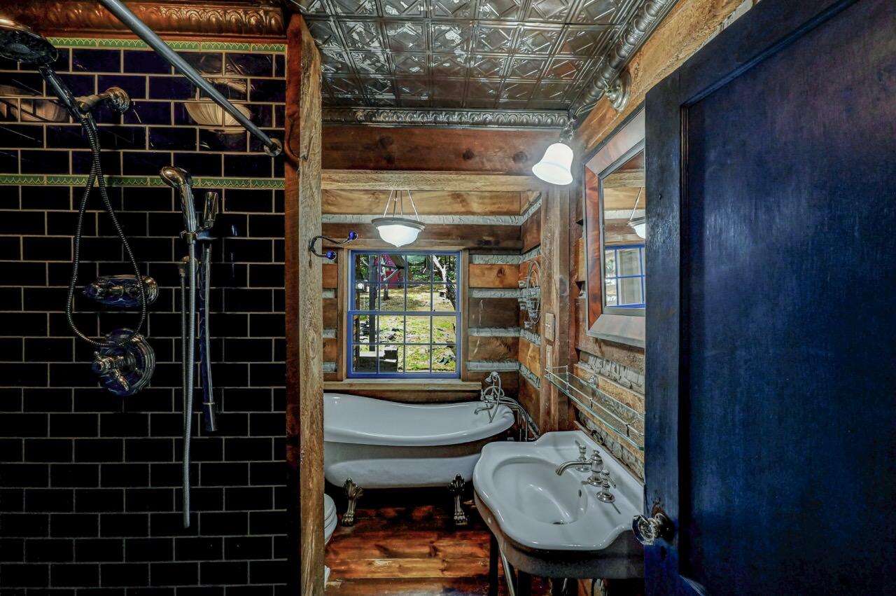 2285 Bear Town Road Canadensis, PA 18325 - Photo 34 of 58 a bathroom with a toilet a sink and a shower