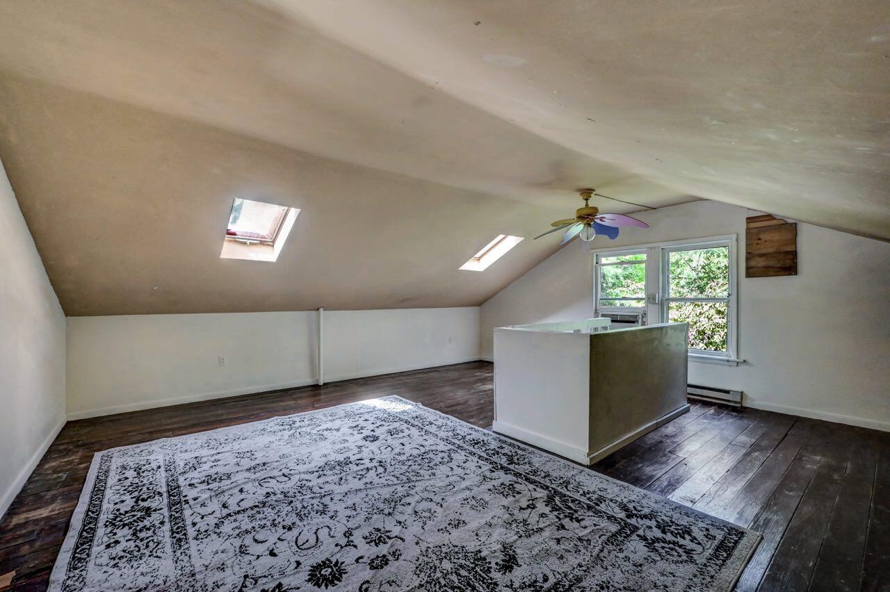 2285 Bear Town Road Canadensis, PA 18325 - Photo 39 of 58 a view of a hallway with wooden floor and stairs