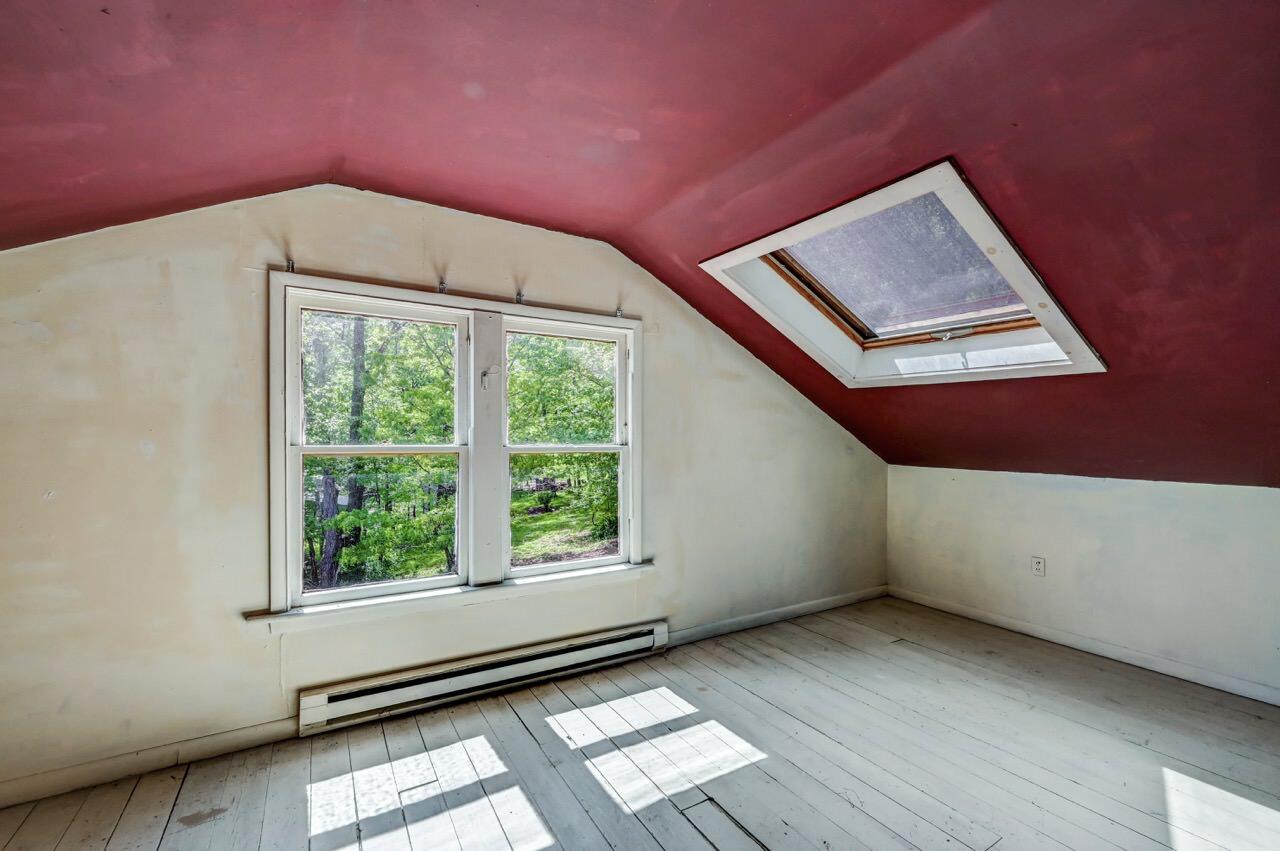 2285 Bear Town Road Canadensis, PA 18325 - Photo 44 of 58 a view of a room with wooden floor and windows
