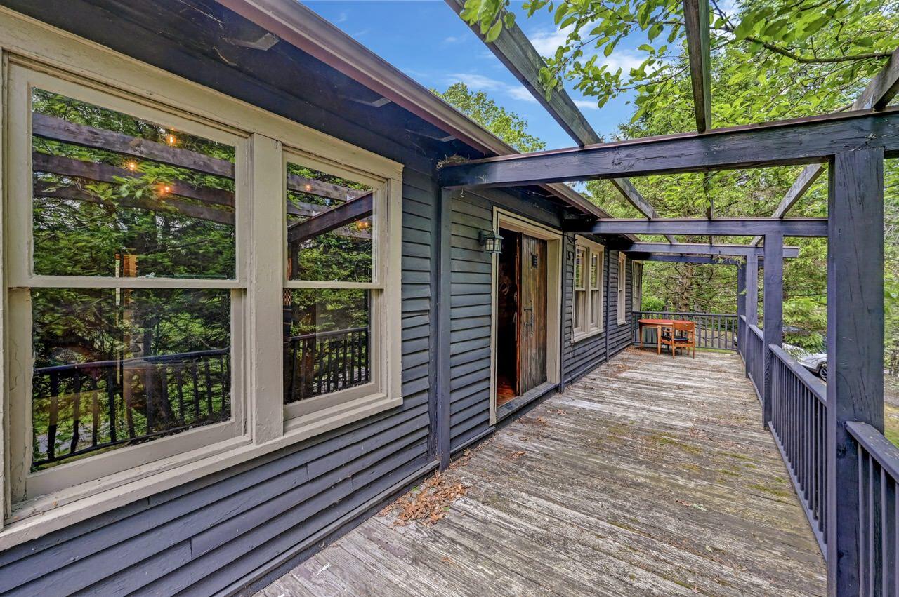 2285 Bear Town Road Canadensis, PA 18325 - Photo 5 of 58 a view of a room with wooden floor and deck